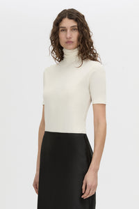 crop view CAMILLA AND MARC Dakota slim fit cream top with ribbed turtle neck.