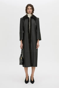 Front-styled-2 view CAMILLA AND MARC Dakota slim fit cream top with ribbed turtle neck.