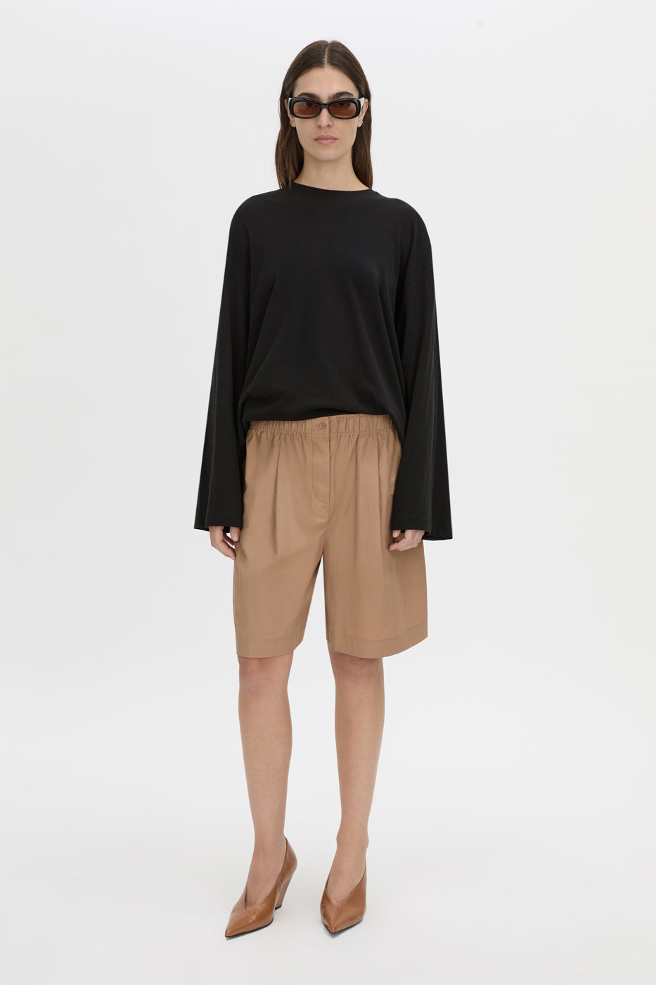 Front-styled view CAMILLA AND MARC Dakota long sleeve top in black.