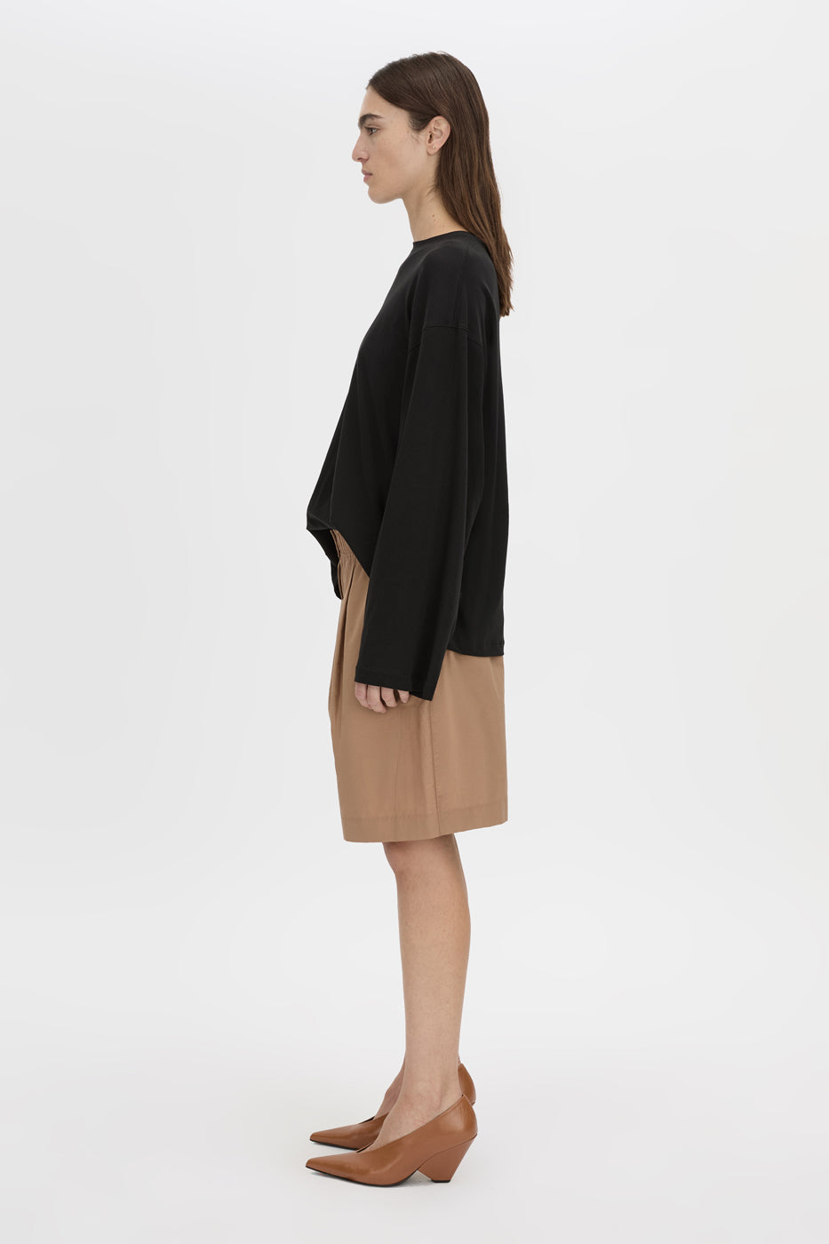 Side view CAMILLA AND MARC Dakota long sleeve top in black.