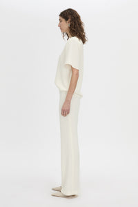 Side view CAMILLA AND MARC Darien pant in cream.