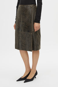 Cropped view CAMILLA AND MARC Dawn Leather Skirt in Black Brown with a wrap midi silhouette.