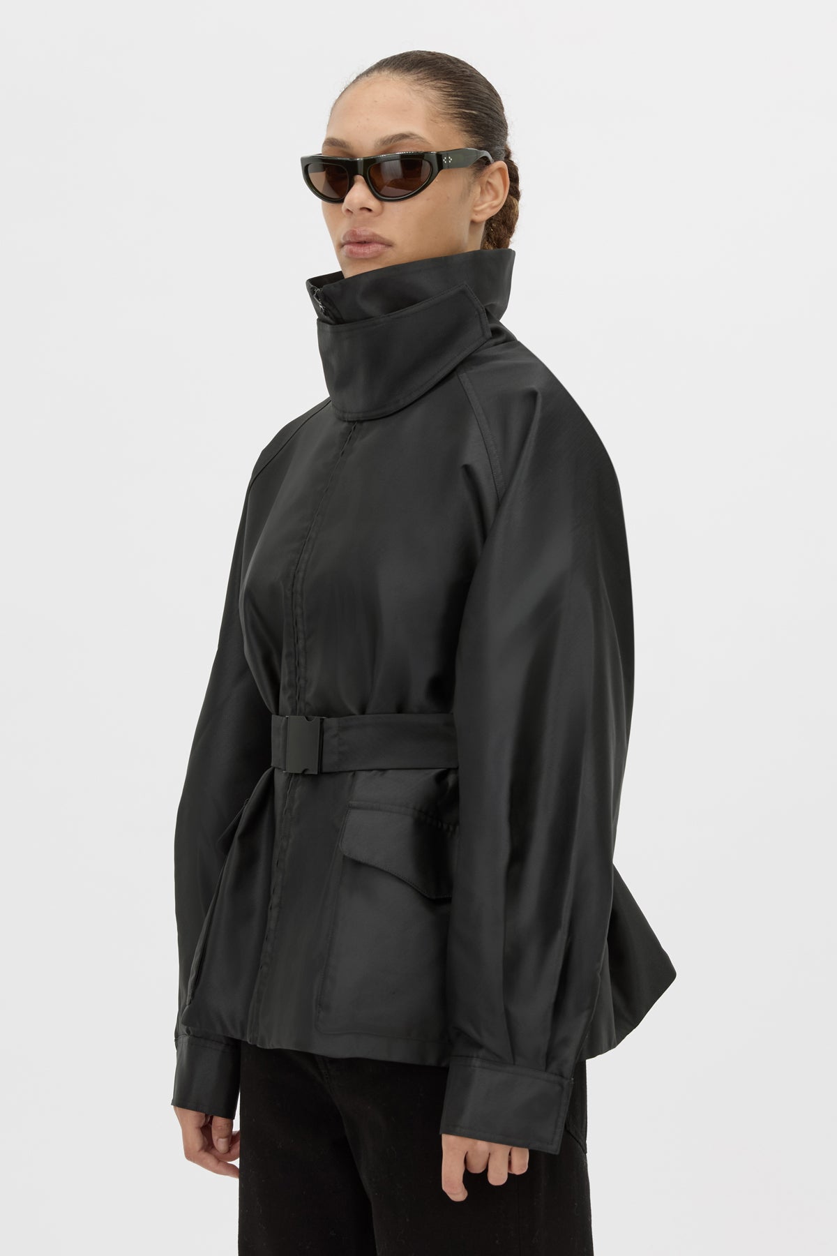 Detail View - CAMILLA AND MARC Drea funnel neck puffer jacket in black. 