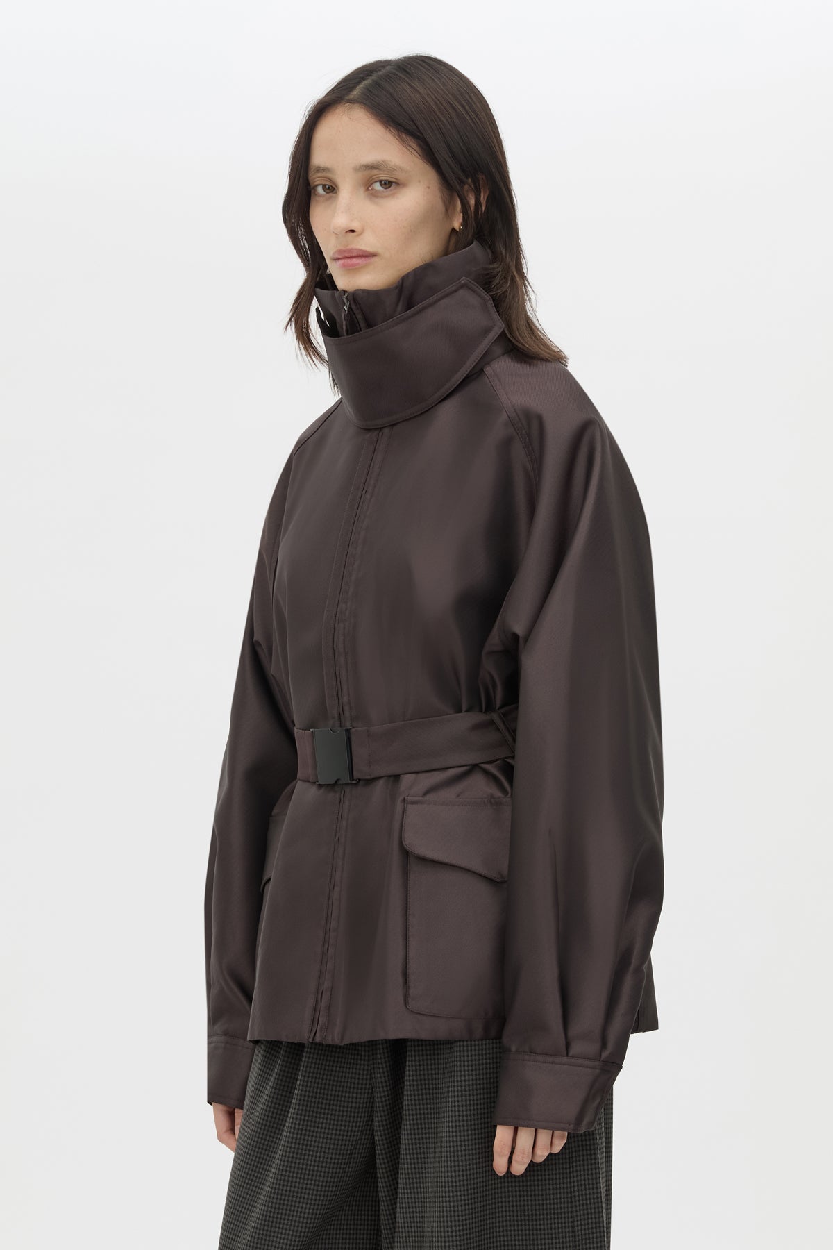 Cropped view CAMILLA AND MARC Drea Puffer Jacket in Espresso Brown with funnel neck and padded puffer silhouette.