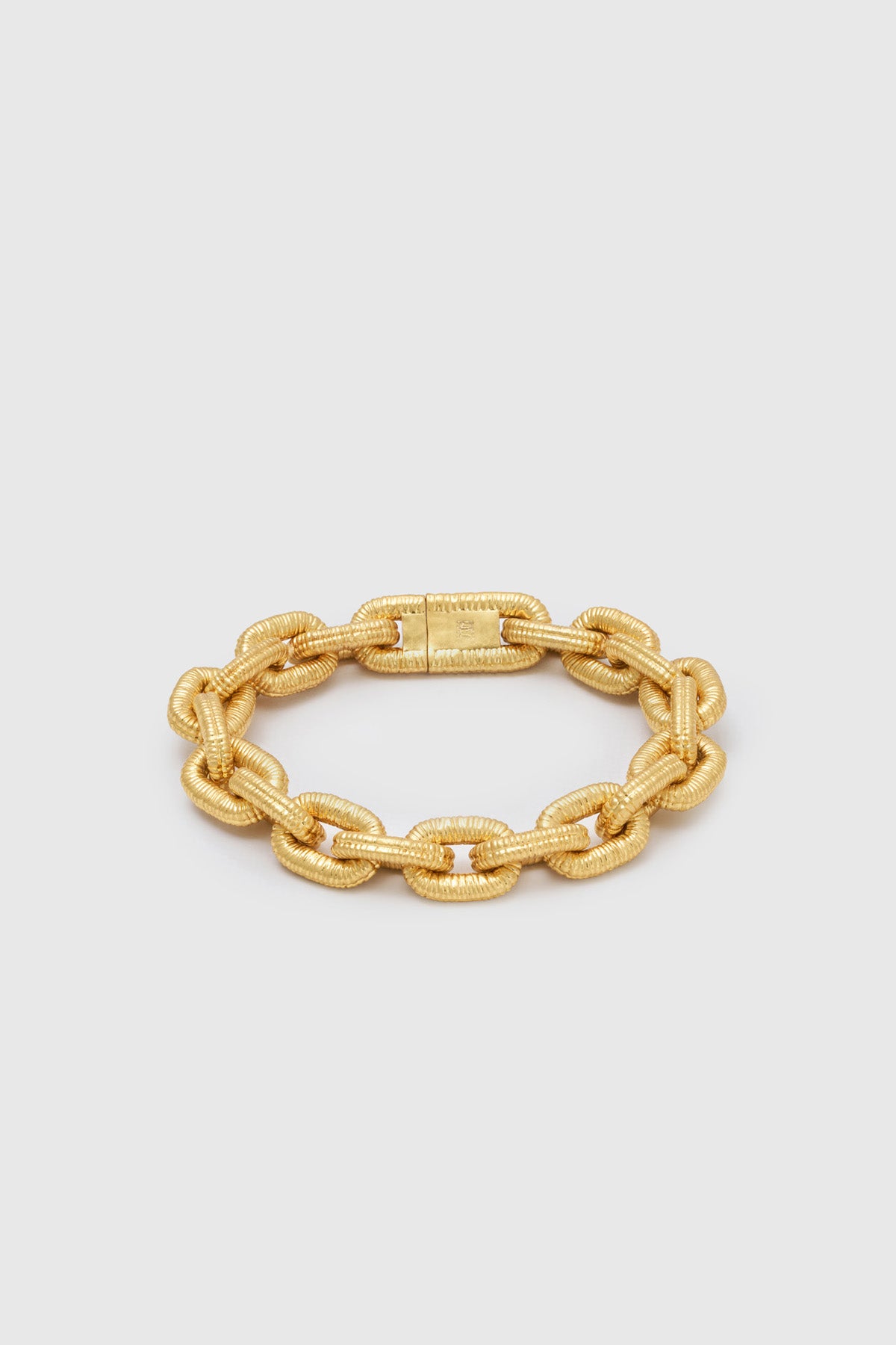 Ghost view CAMILLA AND MARC Eagan Bracelet in gold with handcrafted ruched chain links in solid brass.