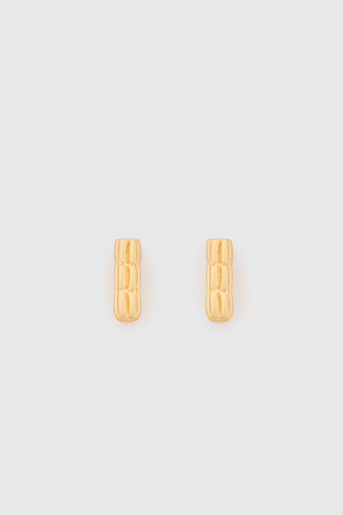 Ghost view CAMILLA AND MARC Eagan Huggies in gold with square huggie design and ruched texture.