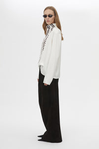 Side view CAMILLA AND MARC Edison Top in Edison Print with bespoke print and full long sleeves.