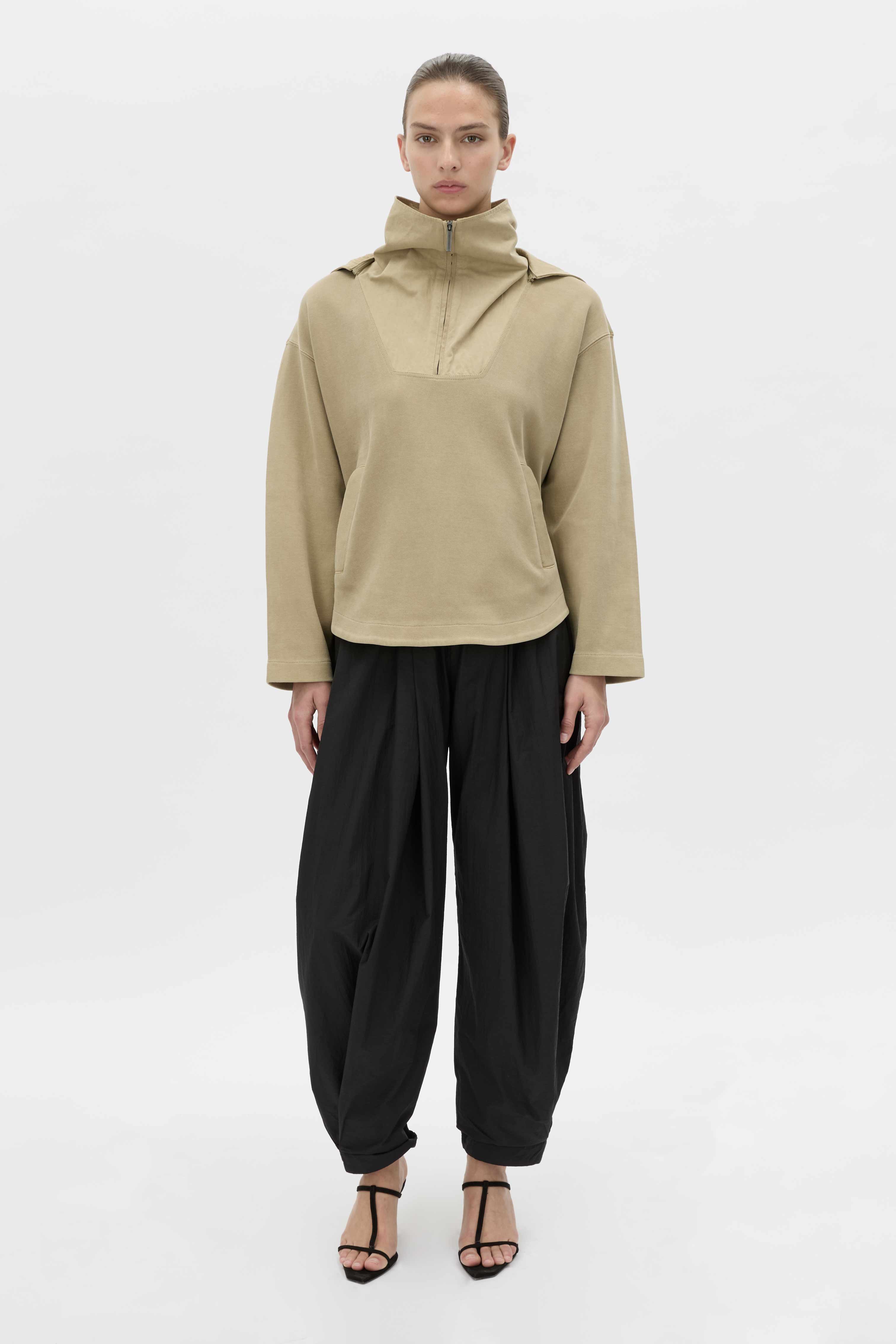 Front-styled view CAMILLA AND MARC Eira hooded pullover in oyster.