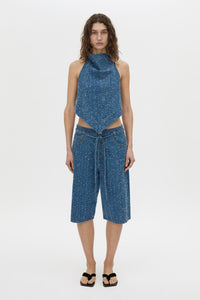 Front-styled view CAMILLA AND MARC Eleni halter neck top in blue neps denim.