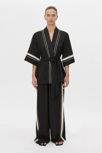 Front view CAMILLA AND MARC relaxed Enna Robe in black with embroidery detail.