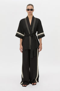 Front view CAMILLA AND MARC relaxed Enna Robe in black with embroidery detail.