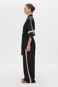 Side view CAMILLA AND MARC relaxed Enna Robe in black with embroidery detail.