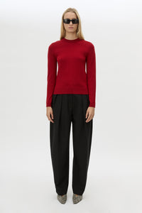 Front view CAMILLA AND MARC Esme Knit Sweater in Cherry Red styled with the Tala Barrel Leg Pant.