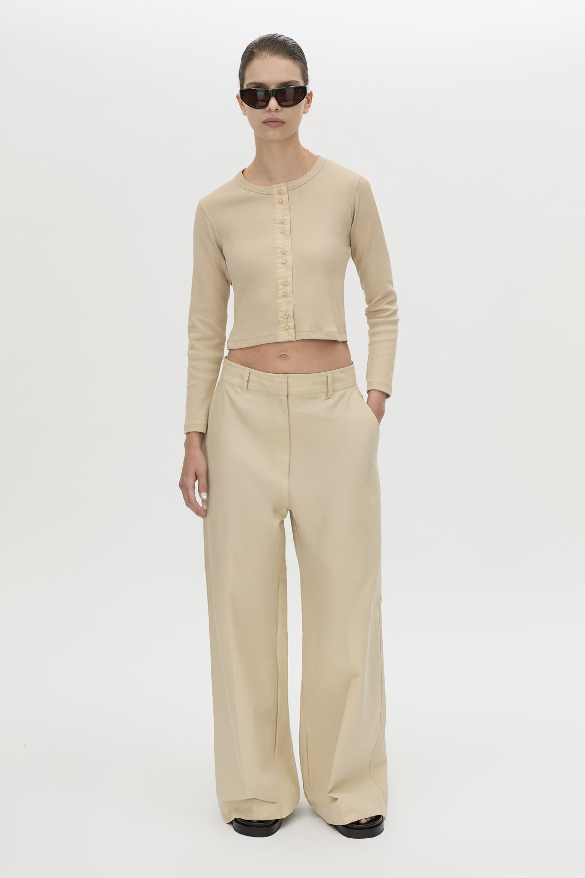 Front styled view CAMILLA AND MARC Florent man style pant in latte.