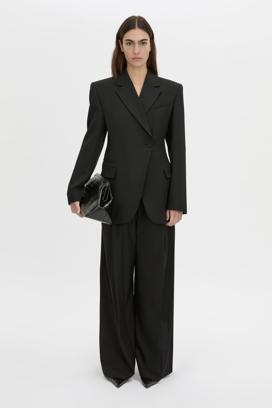 Front-styled view CAMILLA AND MARC Floret single-breasted fitted blazer in black.