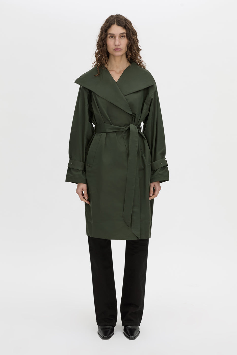 Front view CAMILLA AND MARC oversized Gia Funnel Neck Coat in bottle green with concealed double‑breasted front with internal snaps.