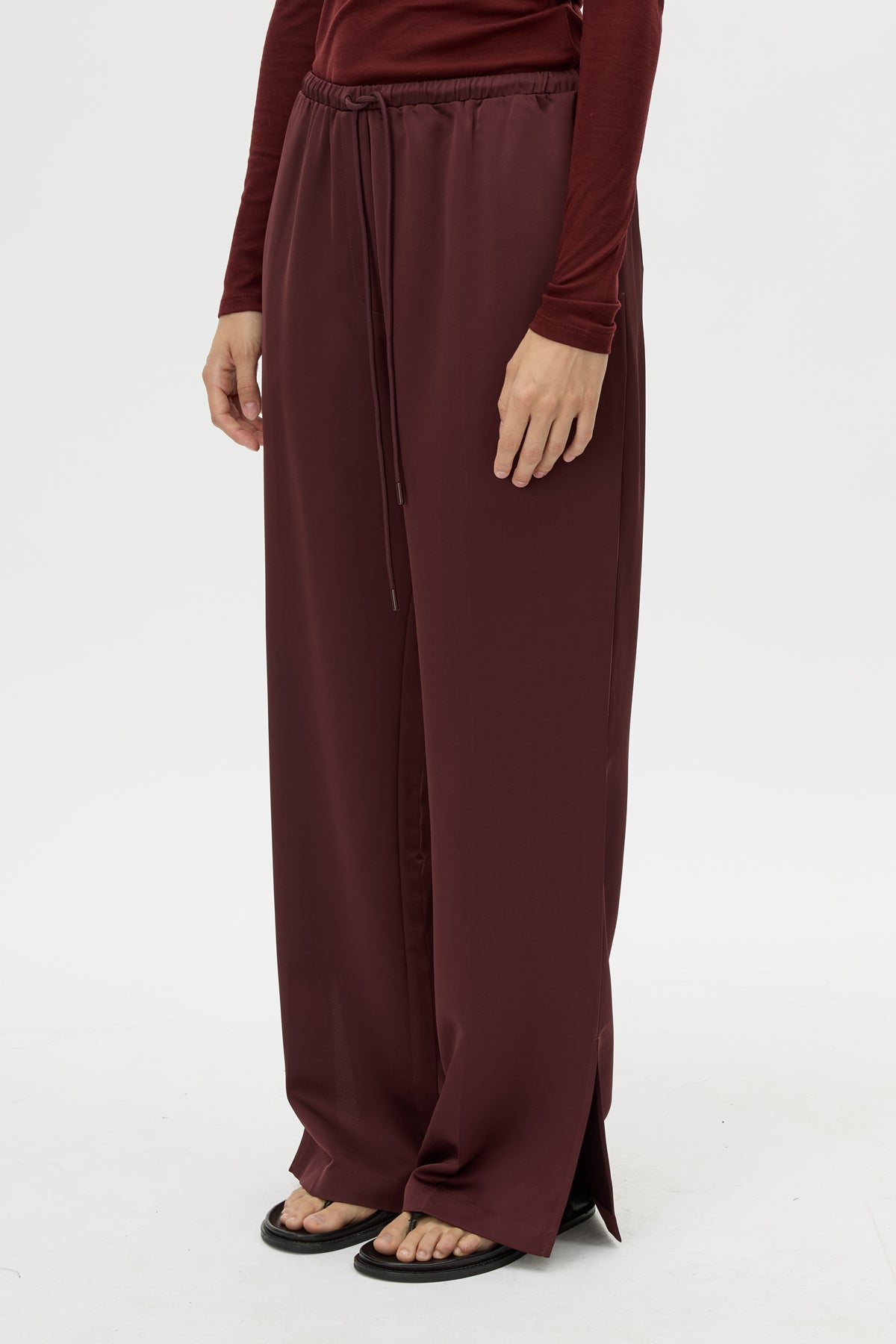Cropped view CAMILLA AND MARC Ground Satin Pant in Black with relaxed fit.