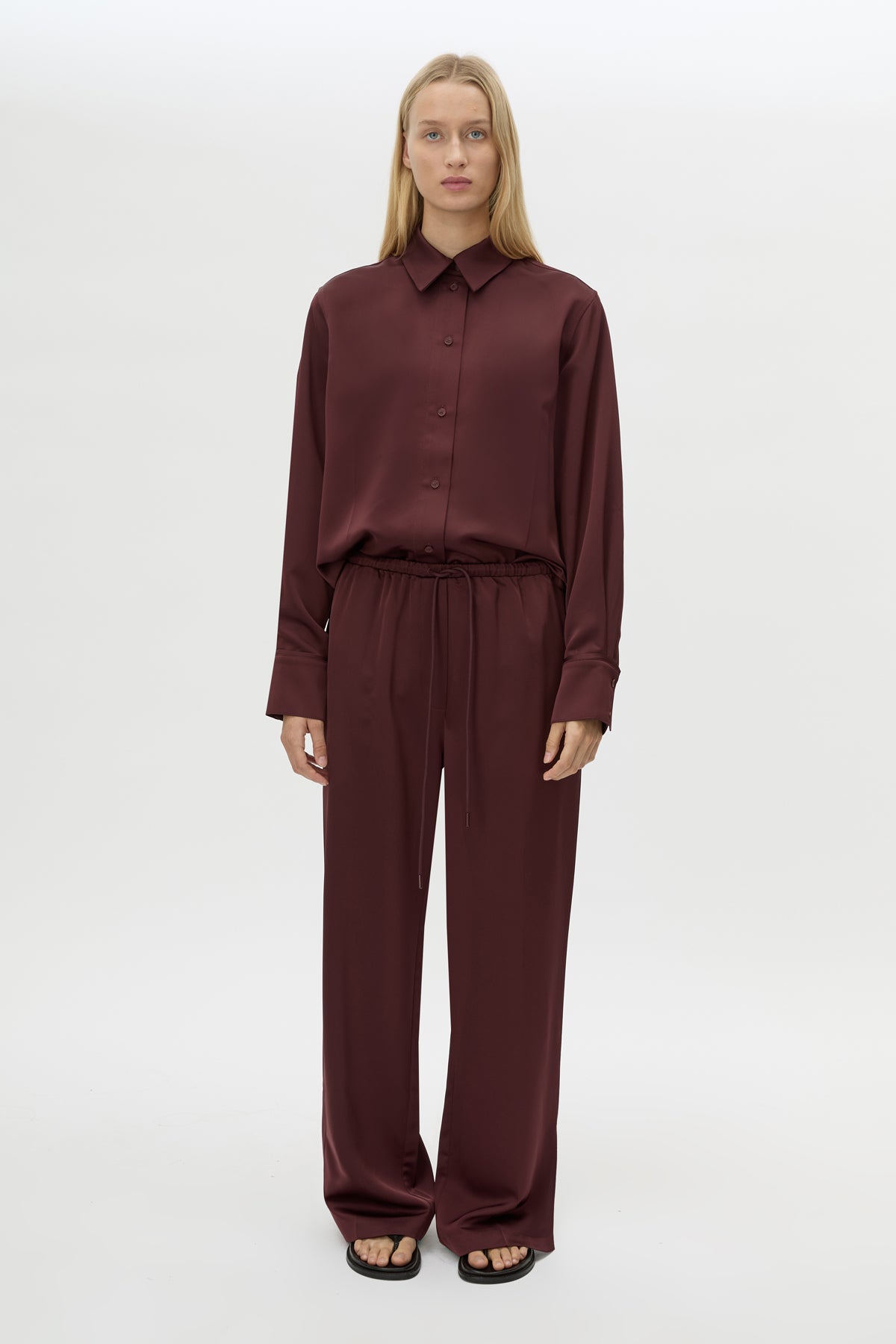Front view CAMILLA AND MARC Ground Satin Pant in Black styled with the Ground Satin Long Sleeve Shirt.
