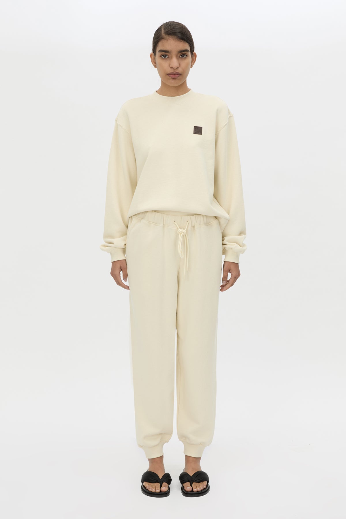 Front view CAMILLA AND MARC Idris Track Pant in Ecru styled with the Idris Tracksuit Top.