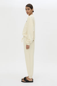 Side view CAMILLA AND MARC Idris Track Pant in Ecru with relaxed fit.