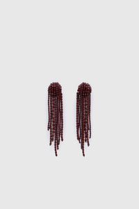 Ghost view CAMILLA AND MARC Irida Drop Earrings in burgundy with glossy beaded drop design.
