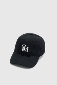 Front view CAMILLA AND MARC Isolde Embroidered Logo Cap in Black and White with front embroidered artwork.