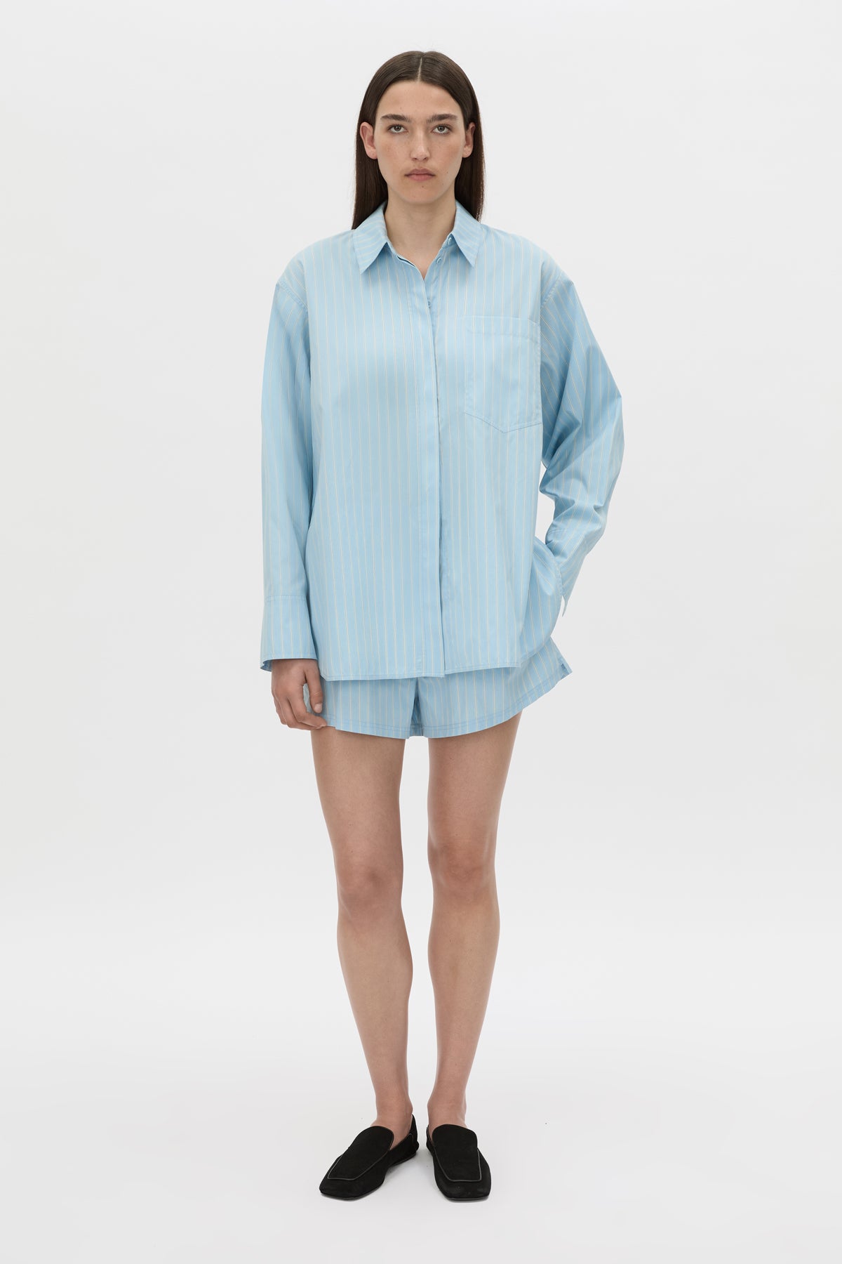 Front-styled view CAMILLA AND MARC Jenie stripe shirt in baby blue stripe.