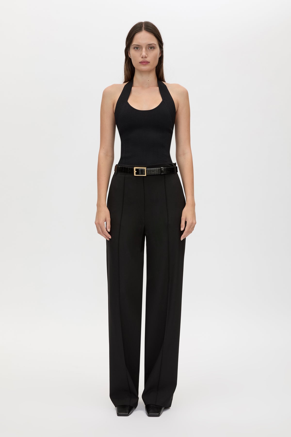 Front styled view CAMILLA AND MARC Juliet Knit Halter Top in Black with ribbed halter neckline.