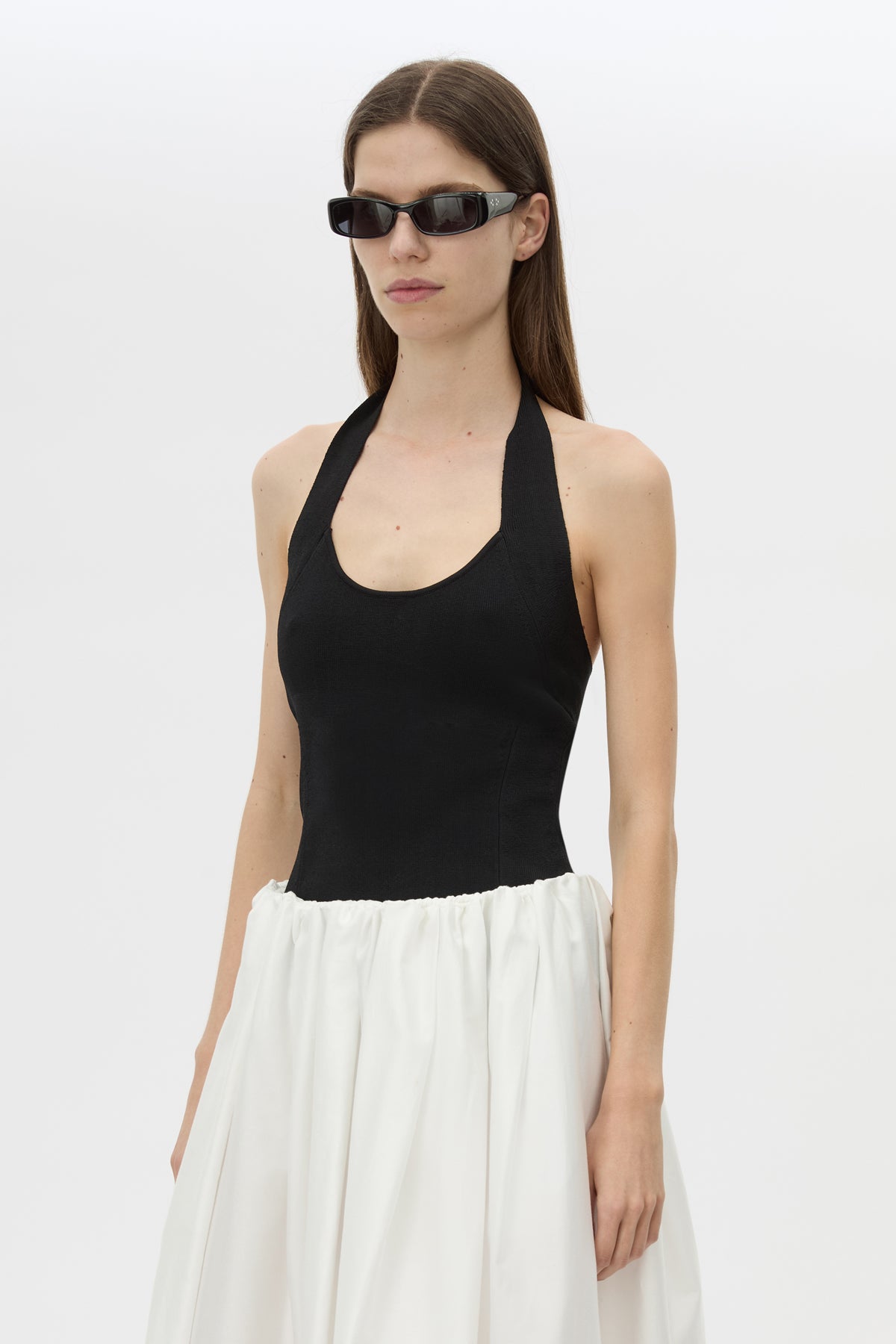 Cropped view CAMILLA AND MARC Juliet Knit Halter Top in Black with ribbed halter neckline.