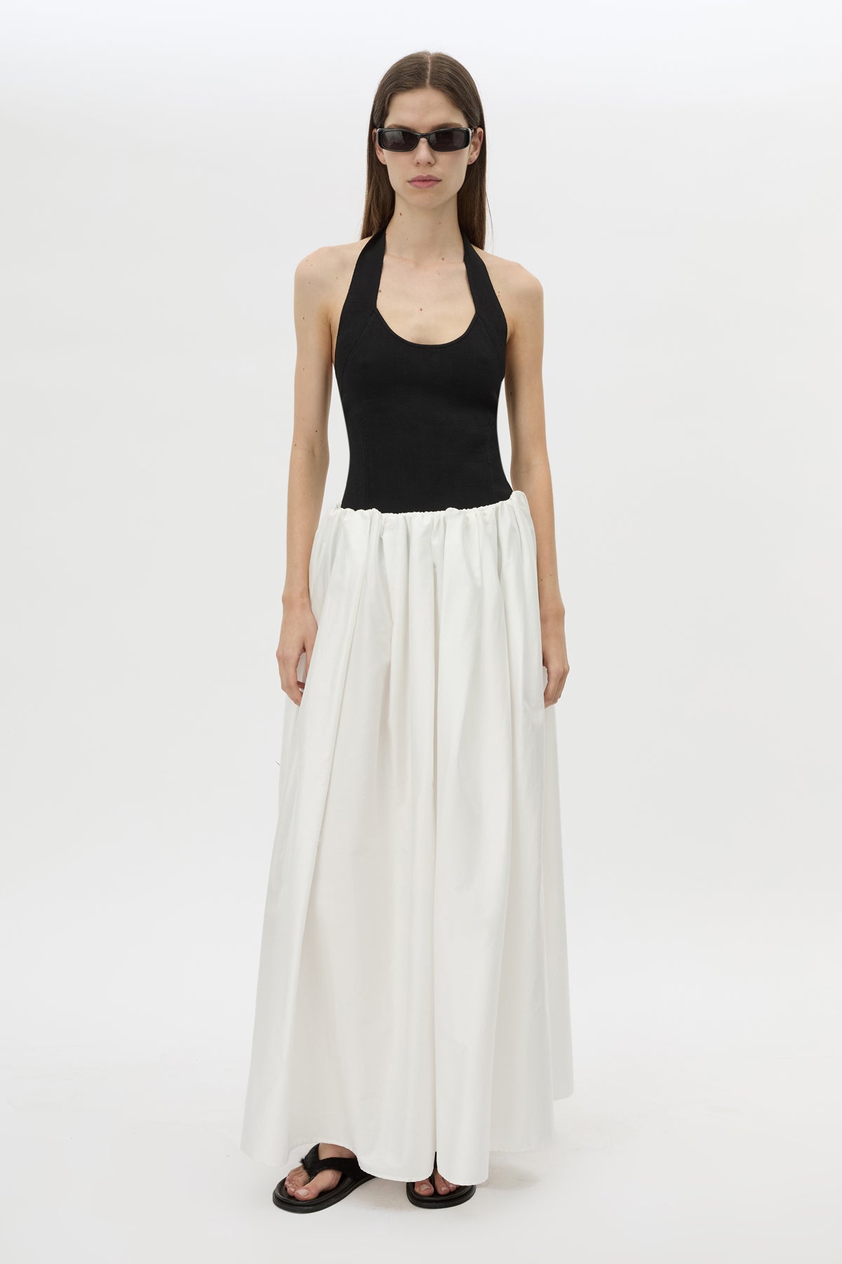 Front view CAMILLA AND MARC Juliet Knit Halter Top in Black with ribbed halter neckline.