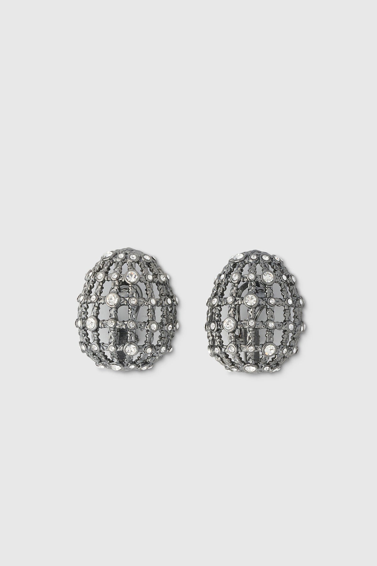 Ghost view CAMILLA AND MARC Jurien Cage Earrings in Silver with rhodium‑plated oval cage design.