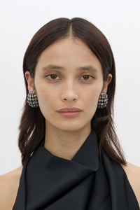 Front view CAMILLA AND MARC Jurien Cage Earrings in Silver with rhodium‑plated oval cage design.