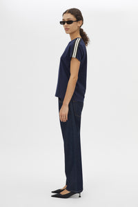 Side view CAMILLA AND MARC Locus Tee in Navy with fitted baby‑tee silhouette and contrast stripe tape.  