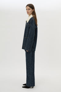 Side view CAMILLA AND MARC Luca Denim Utility Jacket in Indigo Neps with a detachable shearling collar.