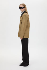 Side view CAMILLA AND MARC Luca Utility Jacket in Camel Brown with a contrast leather collar.