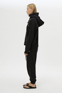 Side view CAMILLA AND MARC Lyra Embroidered Hoodie in Black and White with exposed quarter‑zip opening.