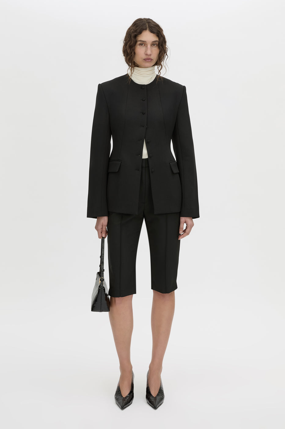 Front-styled view CAMILLA AND MARC Mackinley stretch suit high-waisted capri pants.