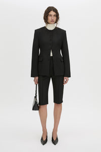 Front-styled view CAMILLA AND MARC Mackinley stretch suit high-waisted capri pants.