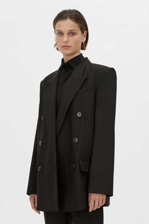 Cropped view CAMILLA AND MARC Mackinley double-breasted black blazer with shoulder pads.