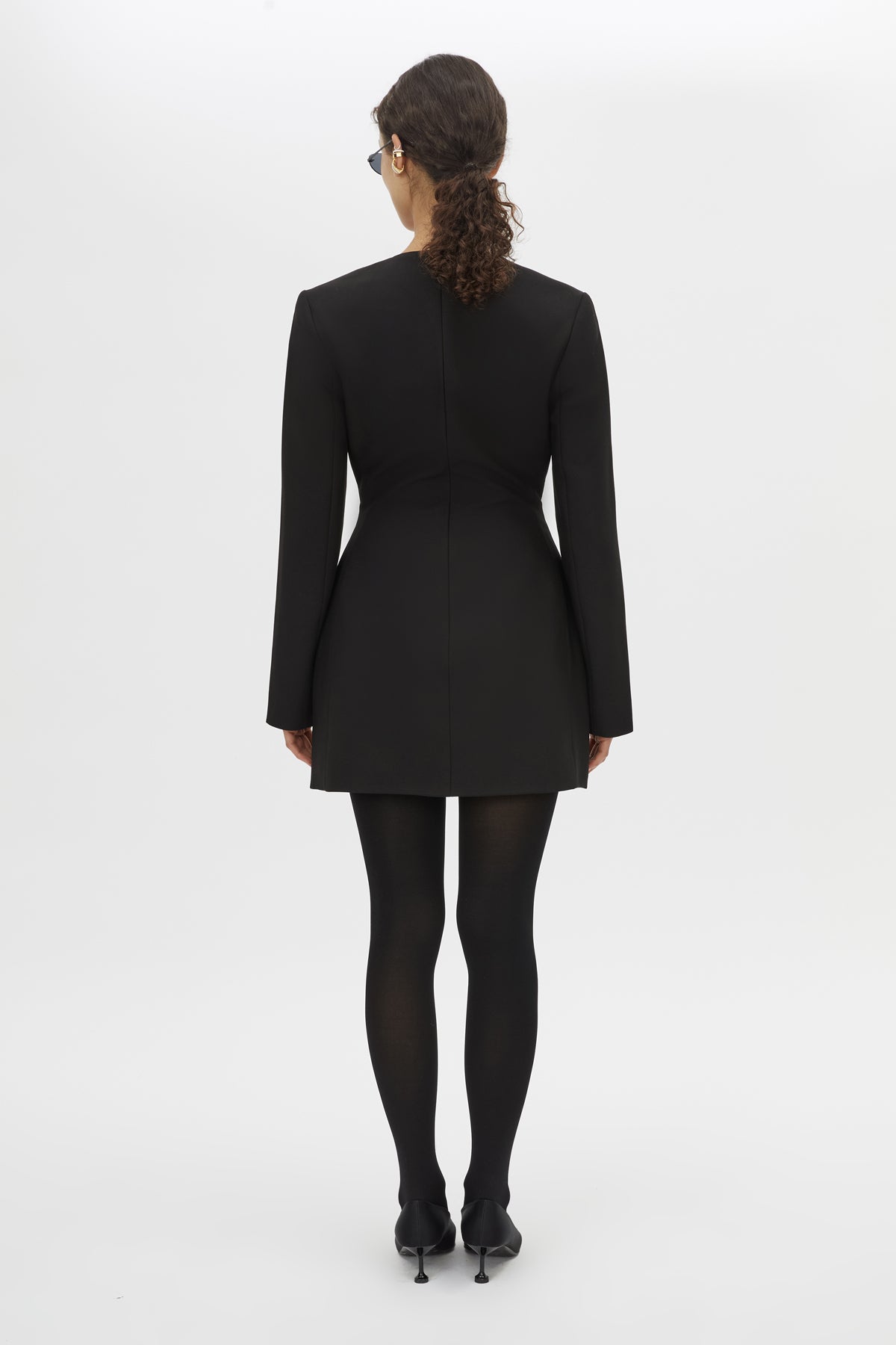 Back view CAMILLA AND MARC Mackinley Mini Dress in Black with long sleeves and plunge V‑neckline.
