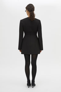 Back view CAMILLA AND MARC Mackinley Mini Dress in Black with long sleeves and plunge V‑neckline.