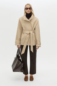 Front view CAMILLA AND MARC Mahdavi Puffer Jacket in Tan with boxy silhouette and double‑breasted design.