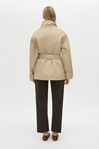 Back view CAMILLA AND MARC Mahdavi Puffer Jacket in Tan with boxy silhouette and double‑breasted design.