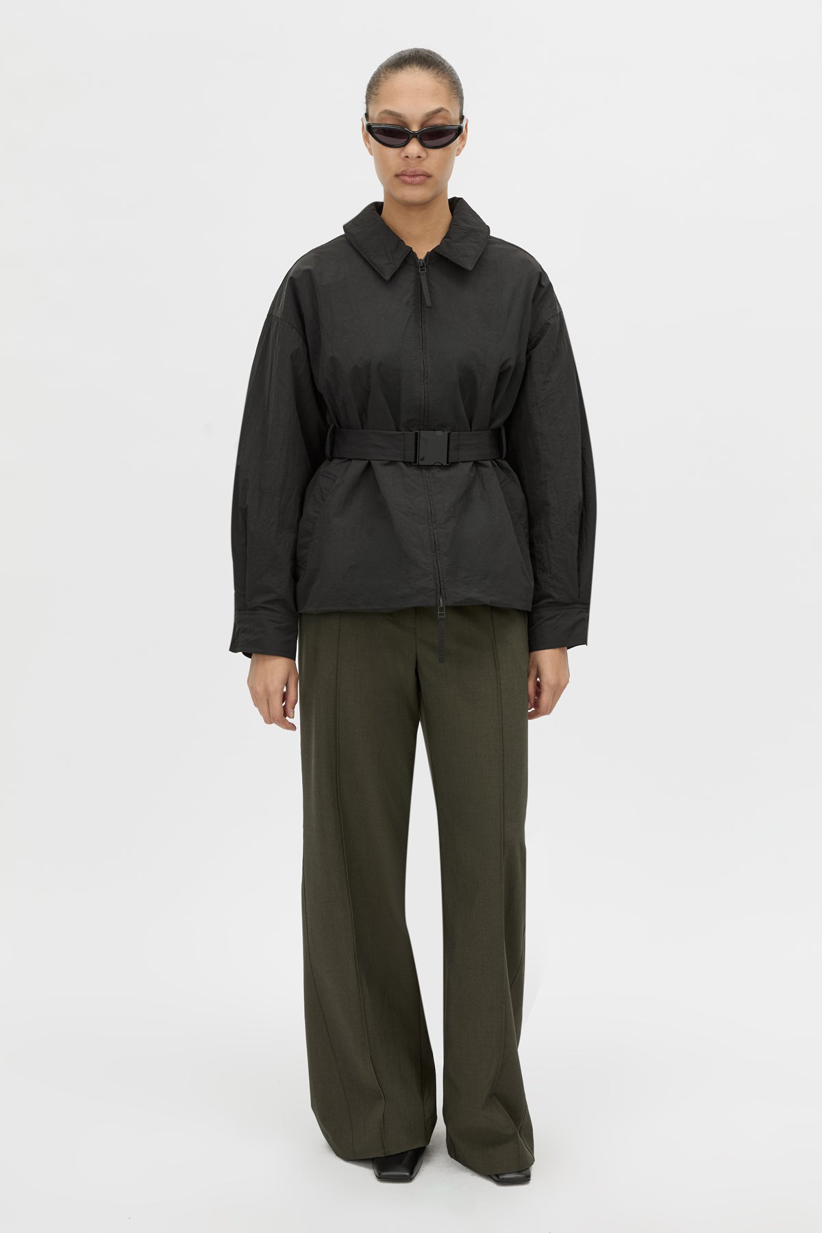 Front View - CAMILLA AND MARC Manon Padded Belted Jacket in black with hammered textured fabrication. 