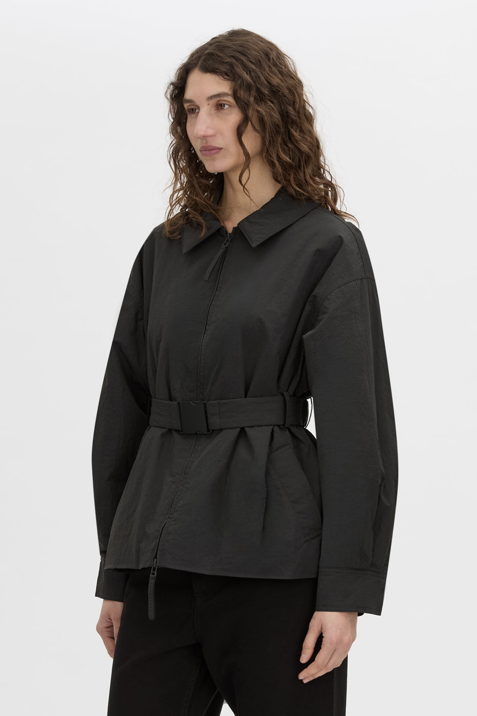 crop view CAMILLA AND MARC Manon Padded Belted Jacket in black with hammered textured fabrication.