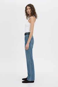 Side view CAMILLA AND MARC Manuela high waisted straight leg classic jean in classic blue.