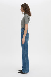 Side view CAMILLA AND MARC Manuela denim jean in dark classic blue.