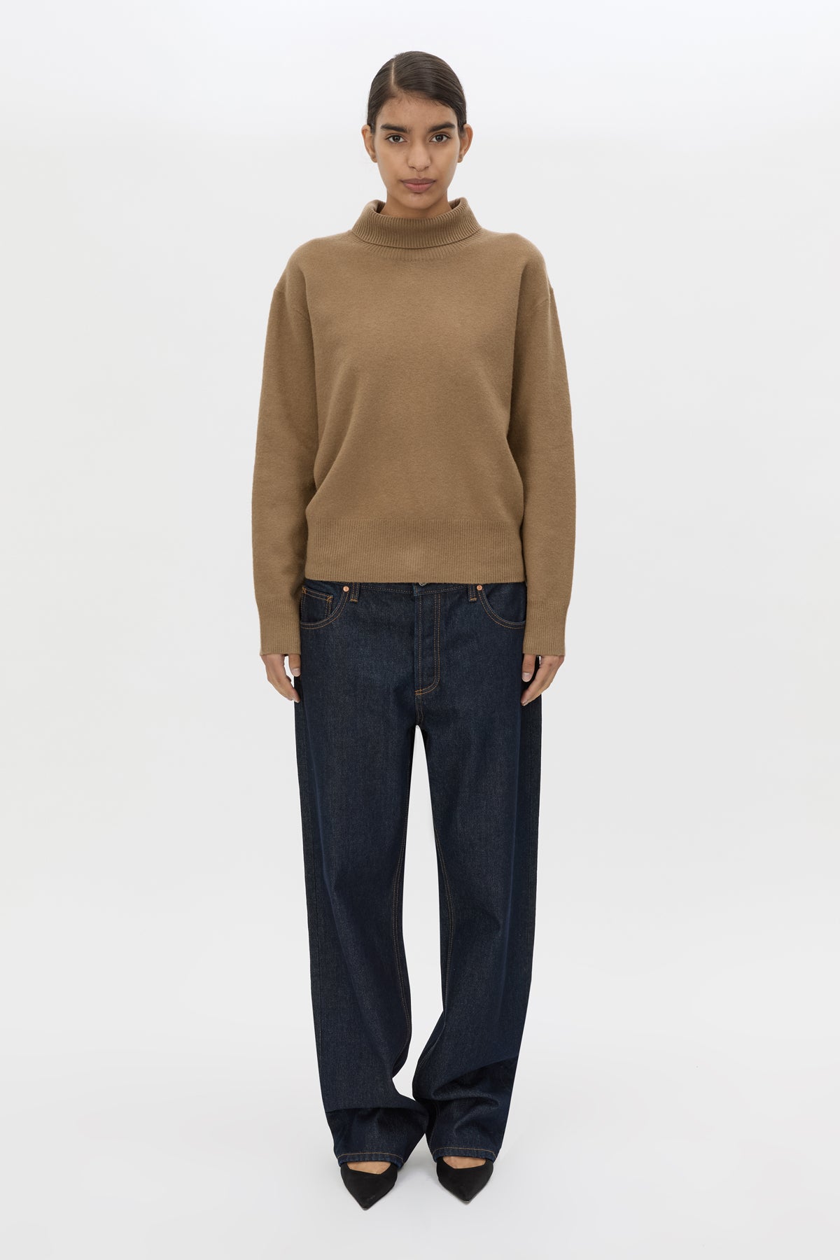 Front styled view CAMILLA AND MARC Margot Turtleneck Knit Sweater in Cinnamon with ribbed collar and hems.