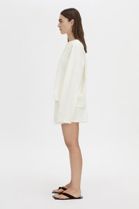 Side view CAMILLA AND MARC Maris mini short in soft white.