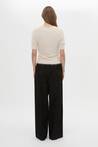 Back View CAMILLA AND MARC Maxime Knit Top in powder pink with a slim fit and knit fabric.